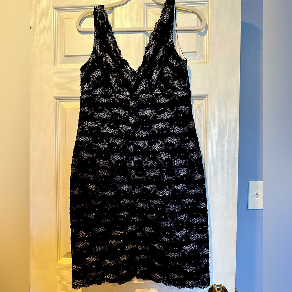 Woman’s black lace dress